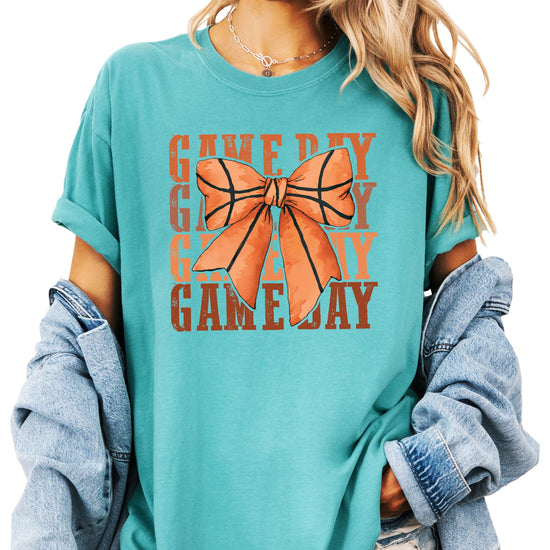 Basketball bow design detail on women's game day shirt