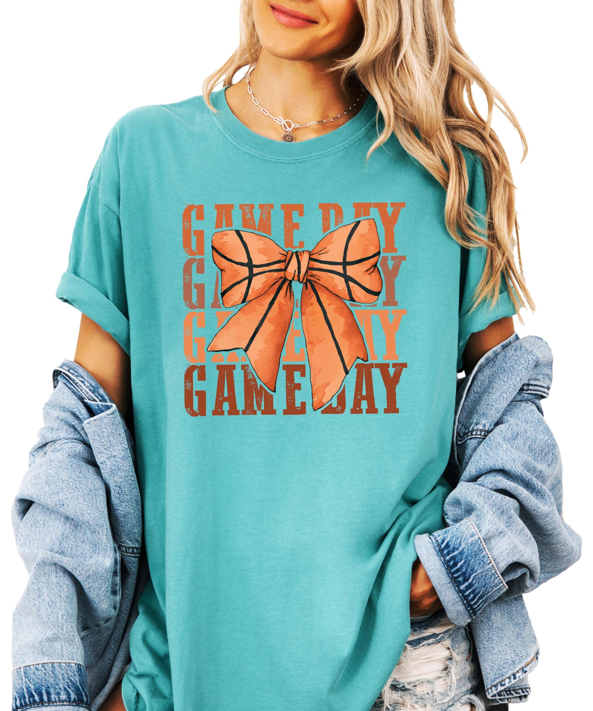 Basketball bow design detail on women's game day shirt