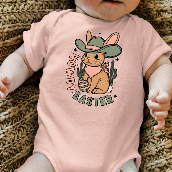 Flat lay of Olive Loves Apple peach Easter bodysuit with western bunny design