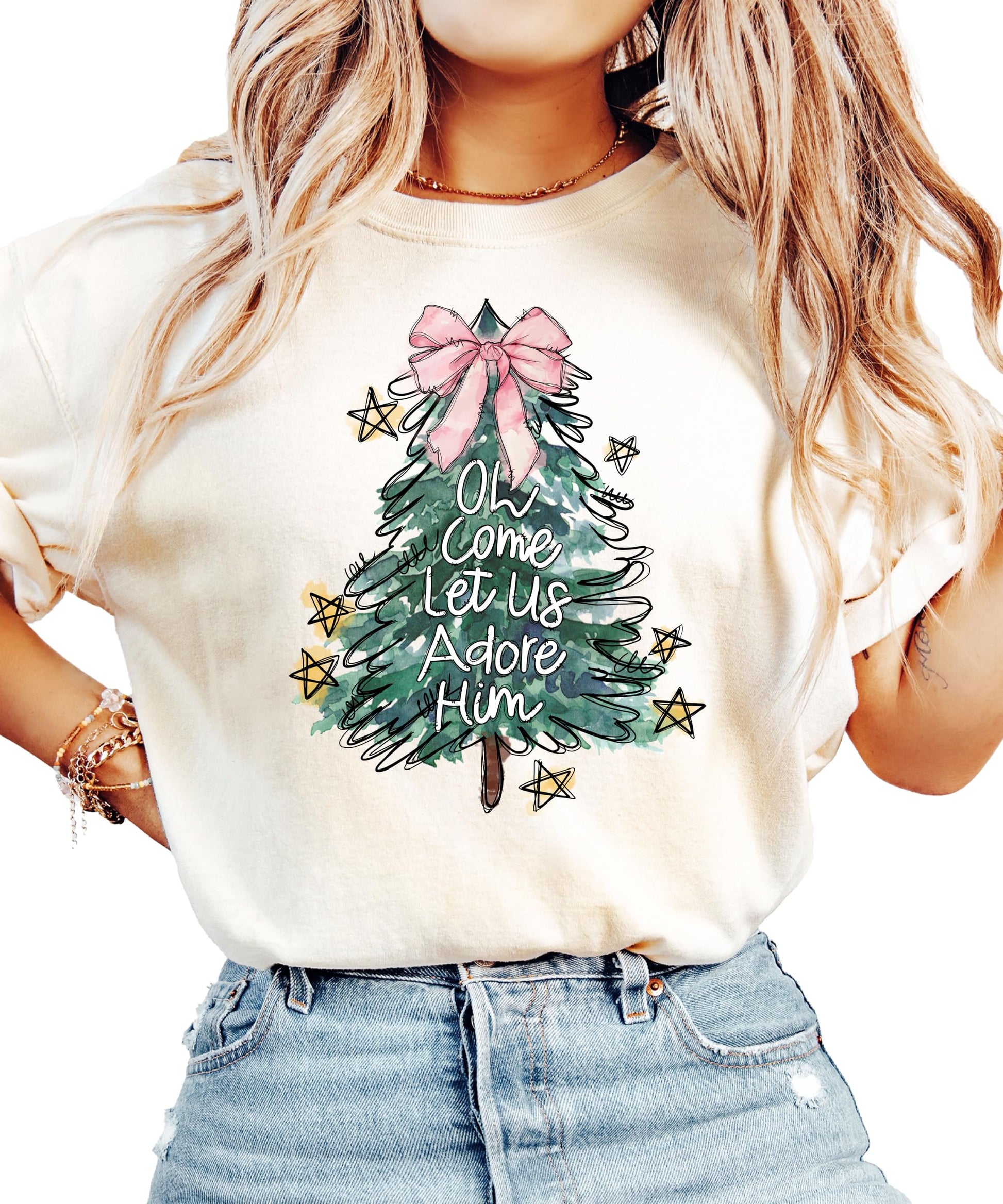 Close-up of Christmas tree with pink bow topper print on seafoam women's holiday shirt