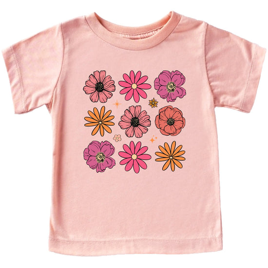 Front view of kids floral tee with vibrant multicolor flower graphic on natural fabric