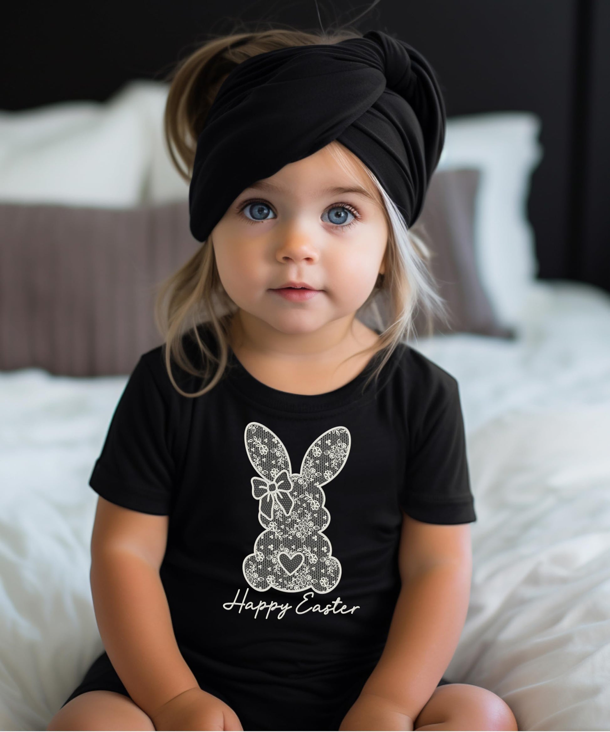 Girls Easter shirt flat lay showing bunny print and Happy Easter text