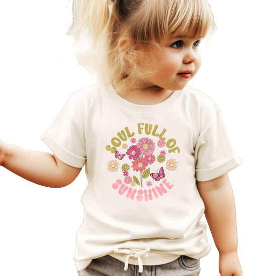 Soul Full Of Sunshine girls t-shirt with colorful floral design and retro typography on natural fabric