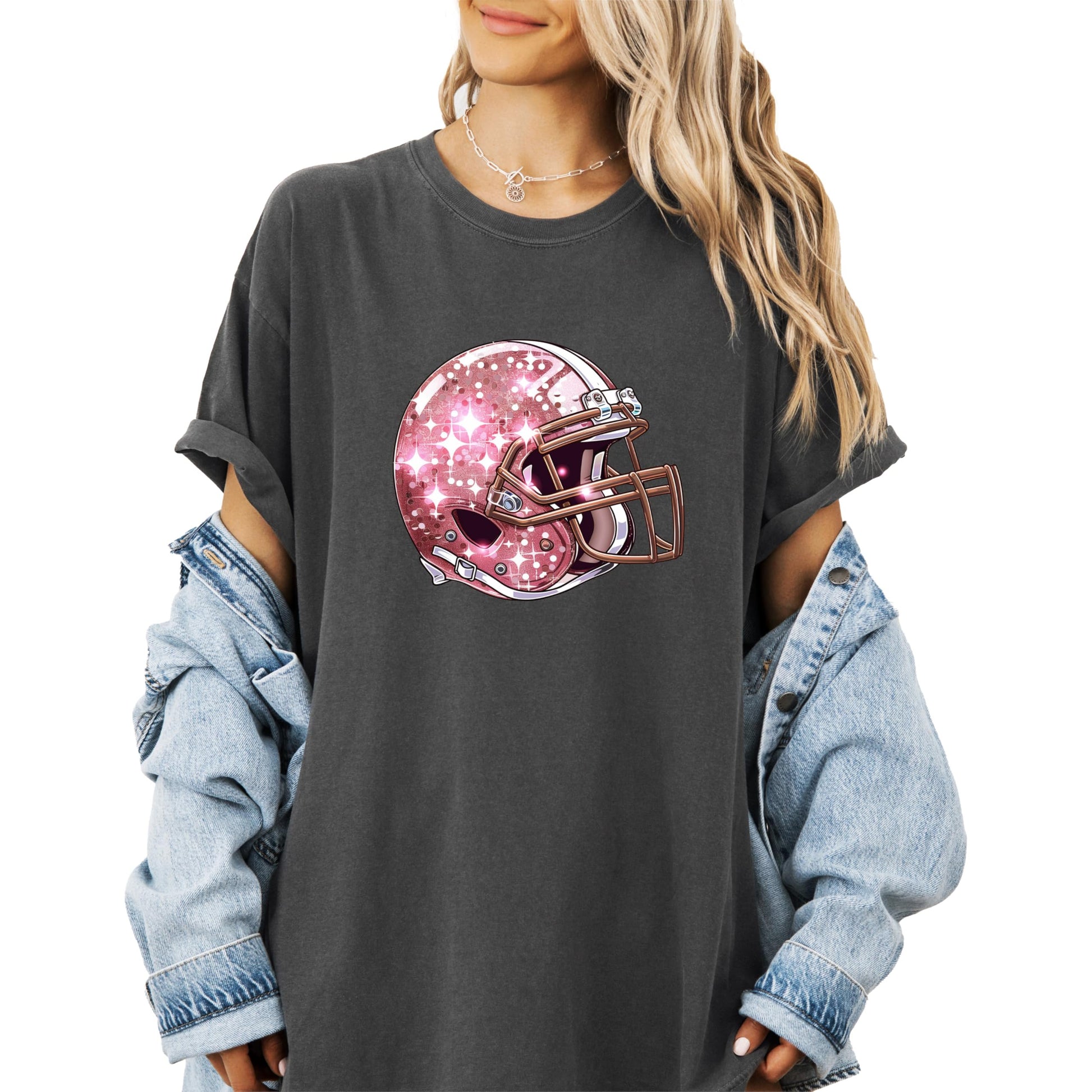 Flat lay of seafoam oversized graphic tee with girly pink football helmet print