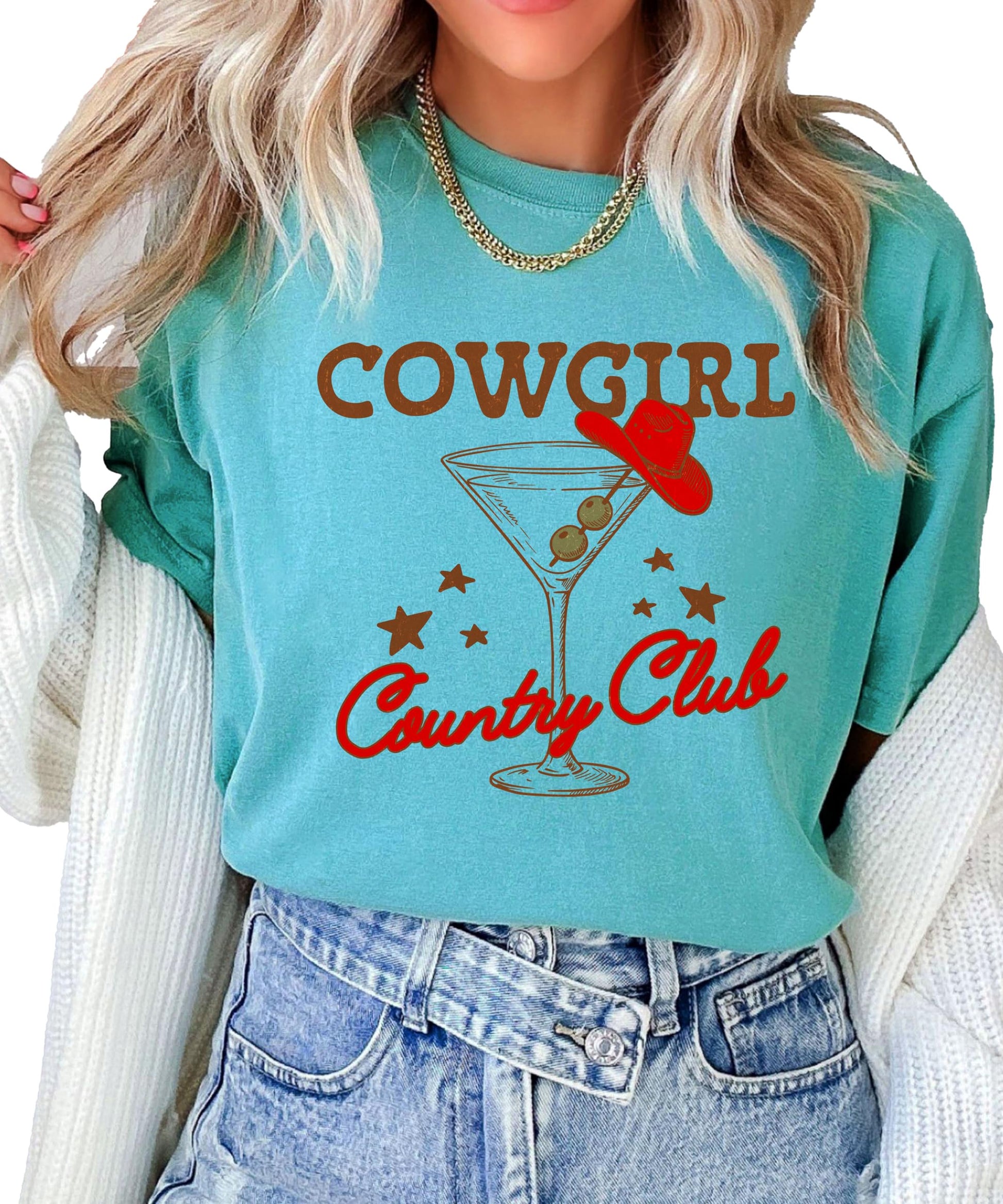 Close-up of vintage cowboy cocktail graphic print on women's country concert shirt