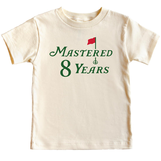 Youth Mastered 8 Years birthday tee with golf pun graphic on natural fabric