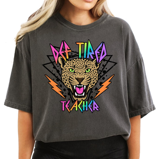 Side or back view of Def Tired Teacher graphic tee showing relaxed unisex fit