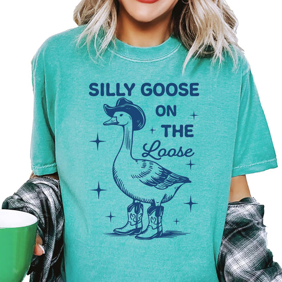 Detail shot of Silly Goose cartoon design with cowboy boots and western hat