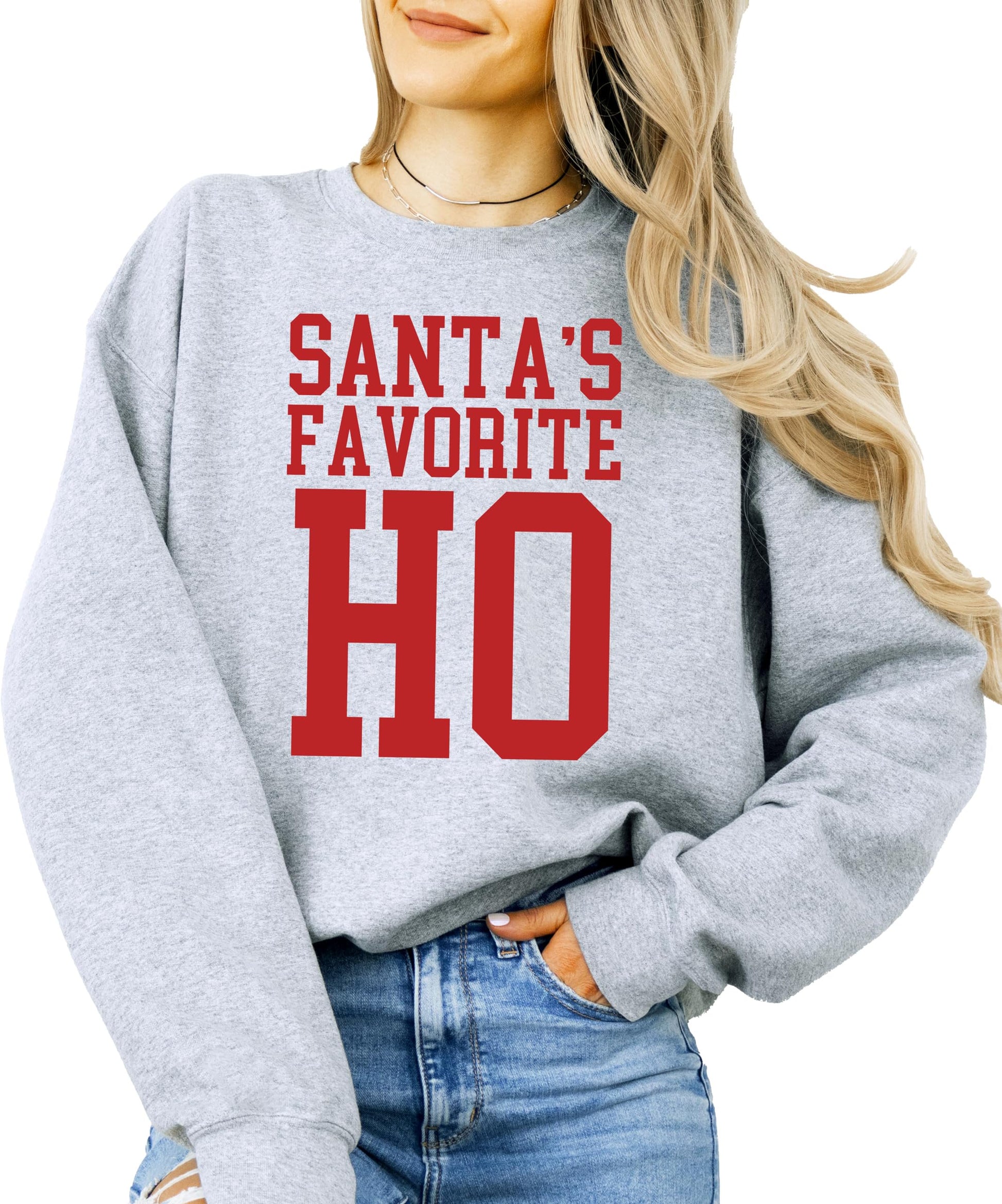 Woman wearing white Santa's Favorite Ho funny Christmas sweatshirt, front view