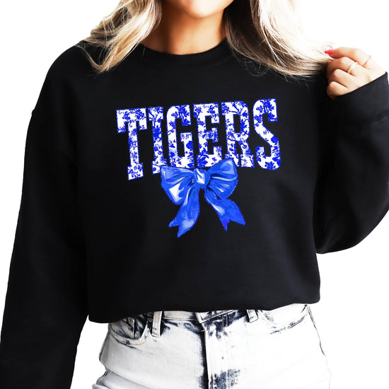 White Tigers blue bow sweatshirt with floral print text and bow graphic design