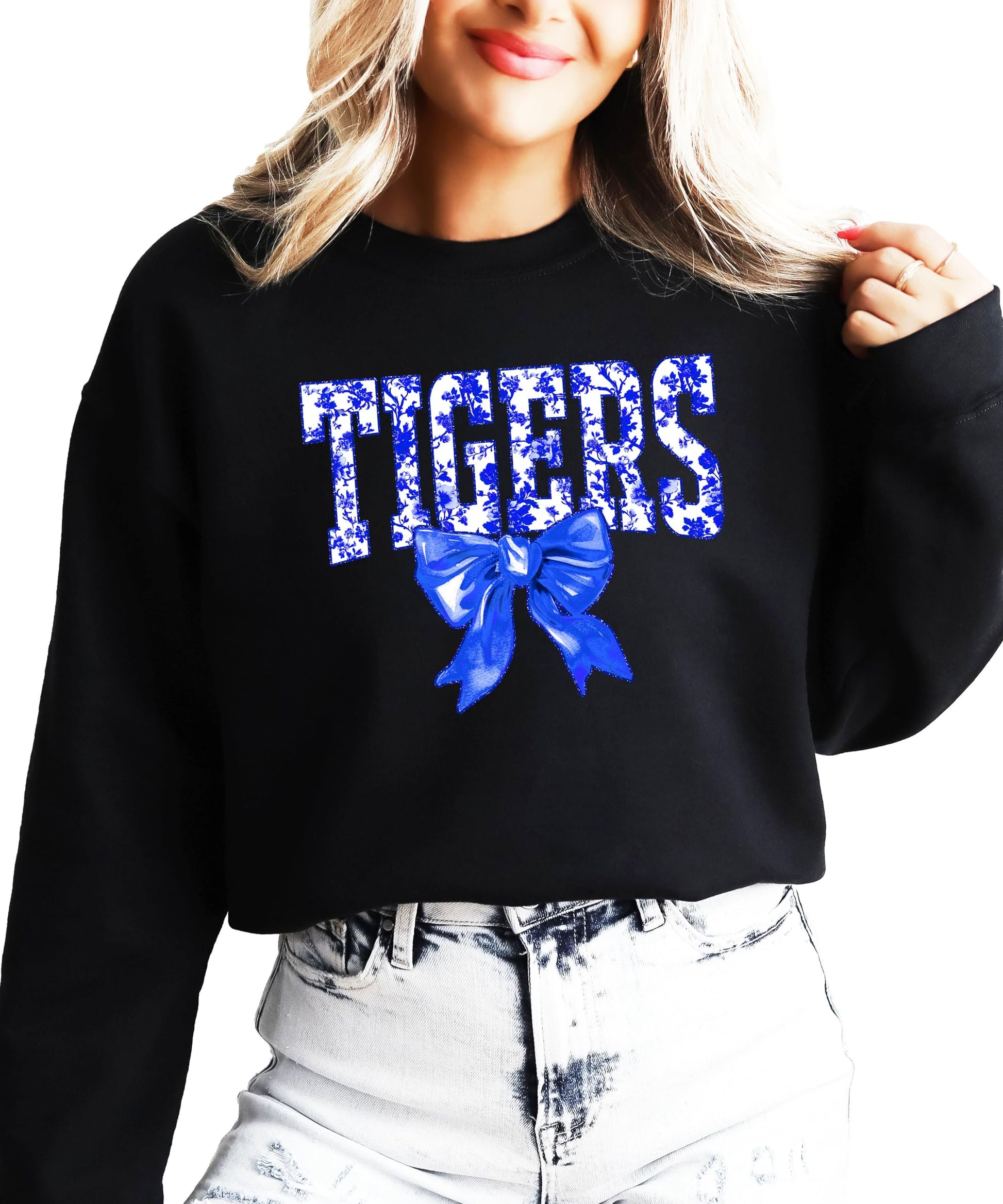 White Tigers blue bow sweatshirt with floral print text and bow graphic design