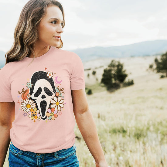 Detail shot of vibrant Scream mask Halloween graphic on soft cotton tee