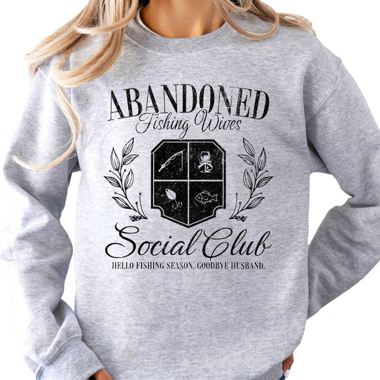 Close-up of Abandoned Fishing Wives Social Club funny fishing wife sweatshirt graphic print