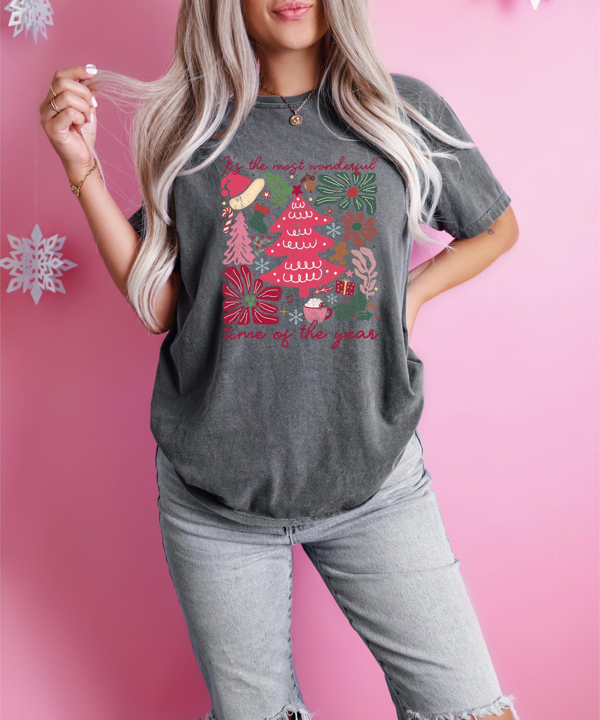 Women's ivory Christmas shirt with colorful festive holiday collage design, styled flat lay