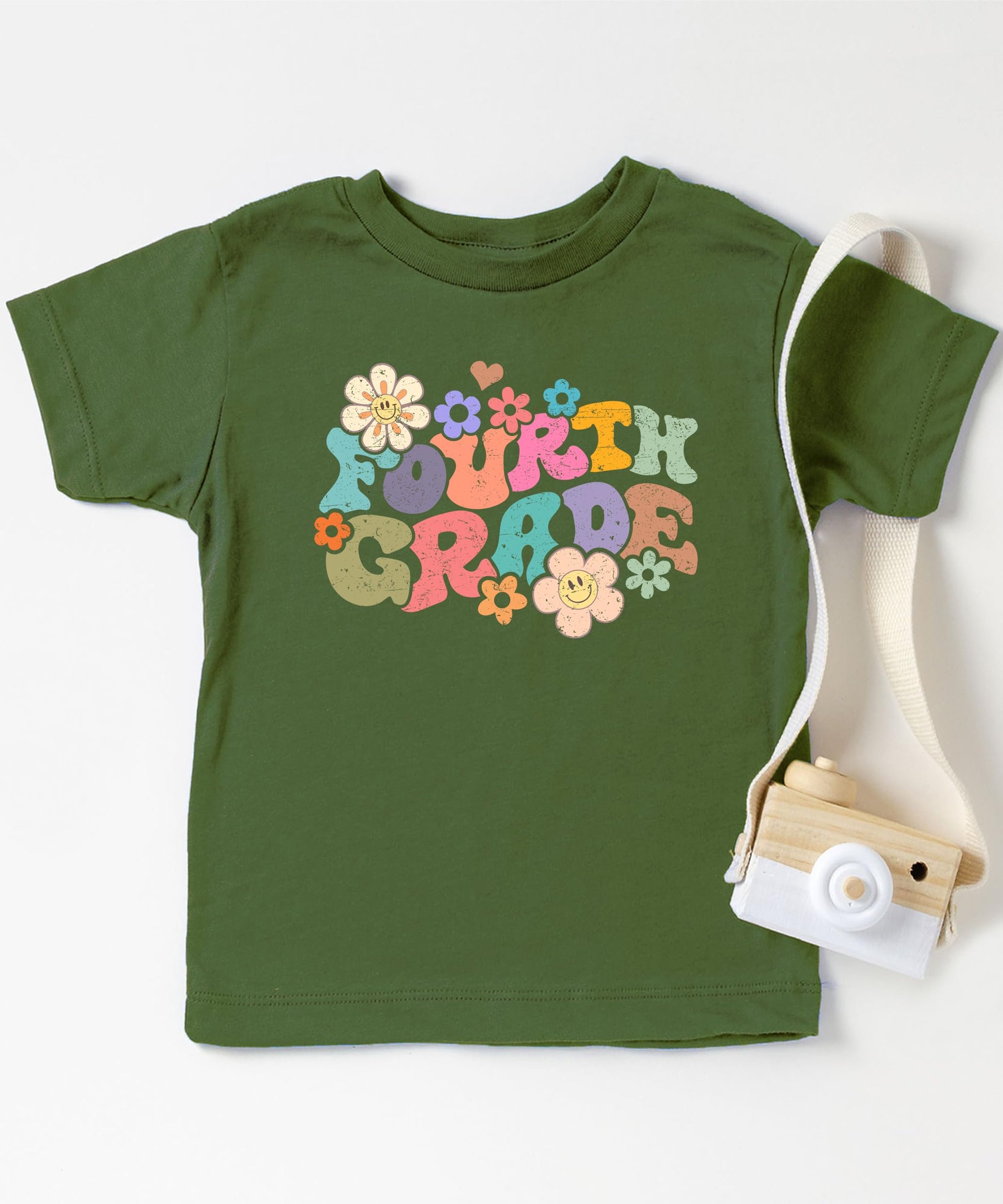 Detail shot of groovy daisy print quality on 4th grade school t-shirt