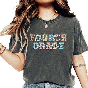 Fourth Grade bold pastel font graphic tee for teachers and teacher aides, front view