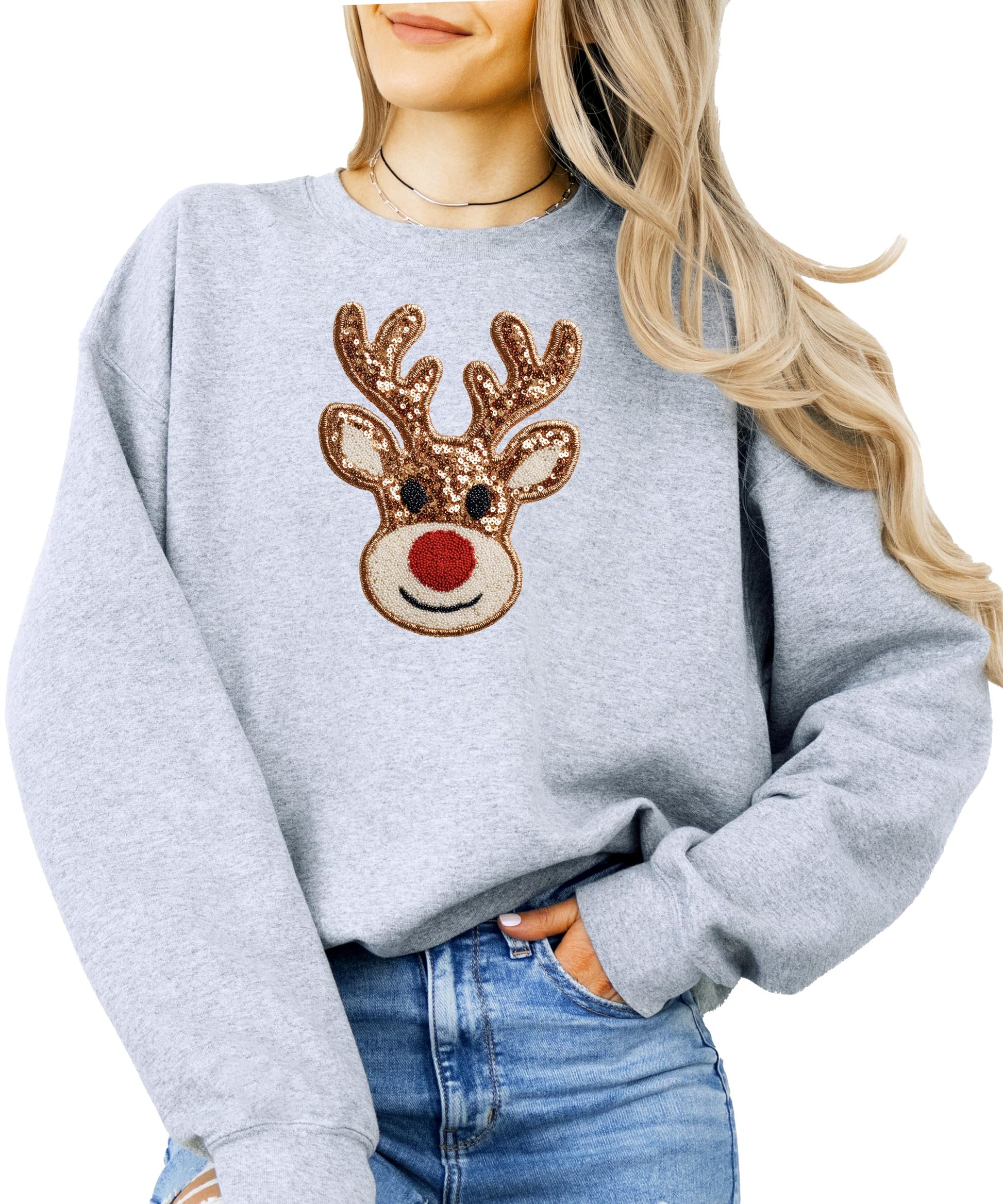 Detail shot of cute reindeer nose and antler print on black holiday sweatshirt