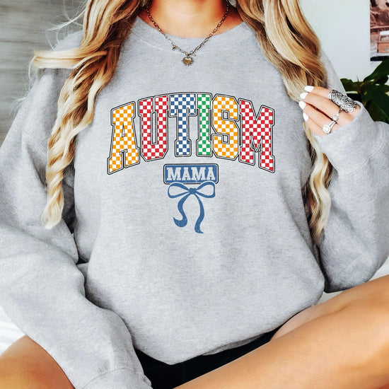 Detail shot of high-quality checkered print on Autism Mama women's sweatshirt