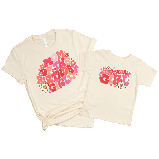 Mom wearing groovy daisy Mom of the Birthday Girl matching shirt for birthday party outfit