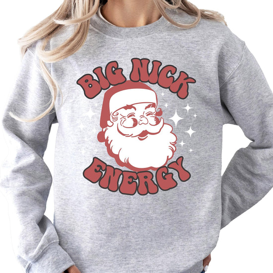 Lifestyle flat lay of Big Nick Energy holiday pullover sweatshirt in black