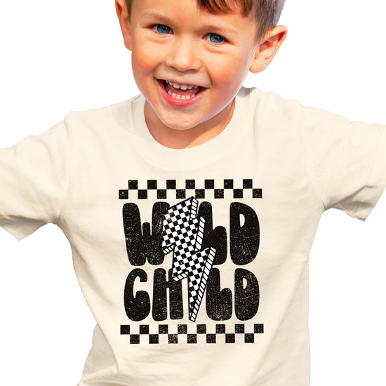 Toddler boy wearing Wild Child checkered tee showing comfortable fit and style