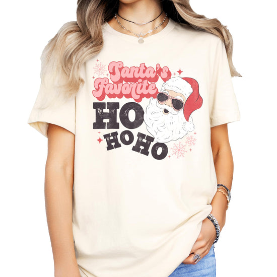Close-up of retro Santa sunglasses graphic print on women's funny holiday tee from Olive Loves Apple