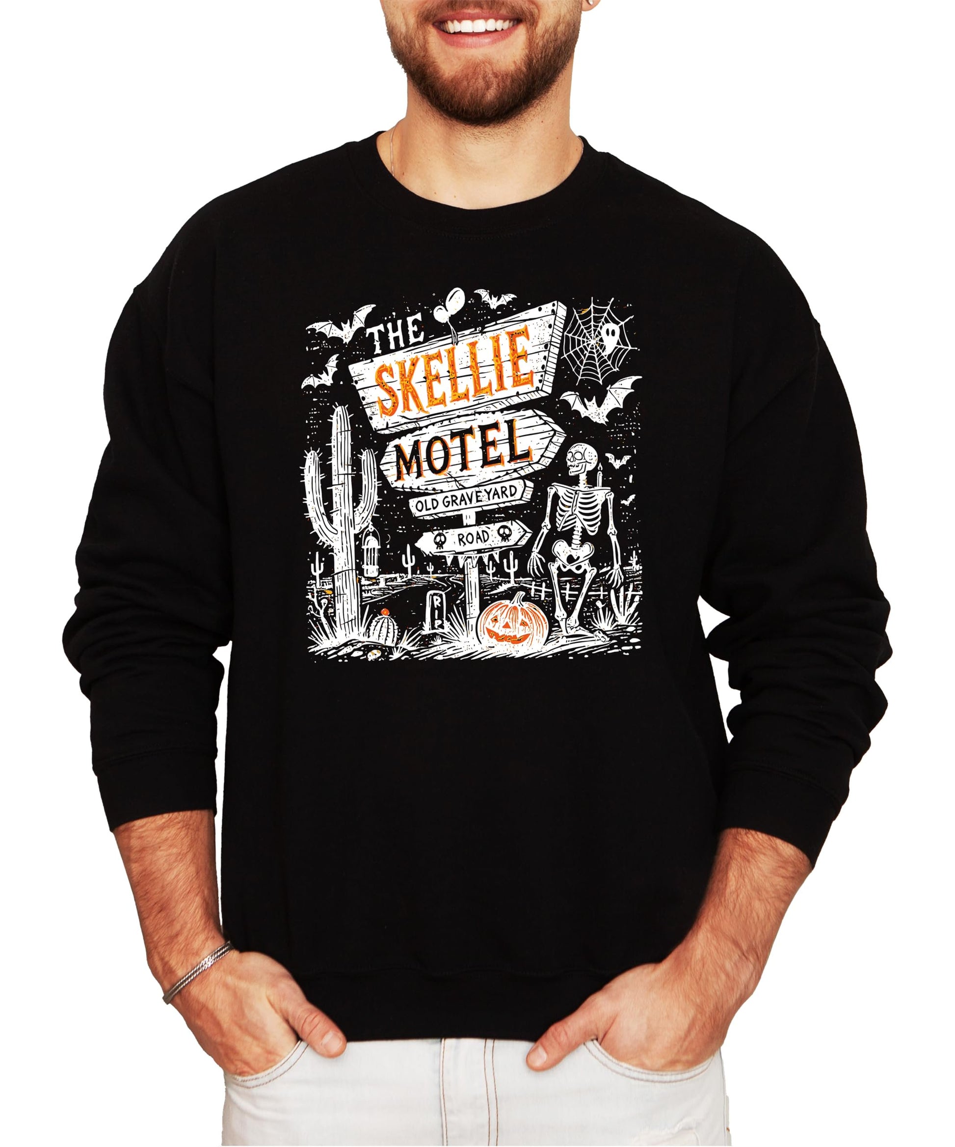 Front view of The Skellie Hotel Halloween sweatshirt showing full graphic print in warm fall tones