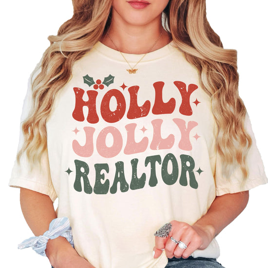 Holly Jolly Realtor Christmas graphic tee in natural color with festive real estate holiday design
