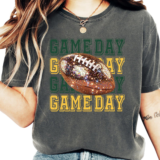 Side or lifestyle view of green and yellow faux glitter football shirt for women