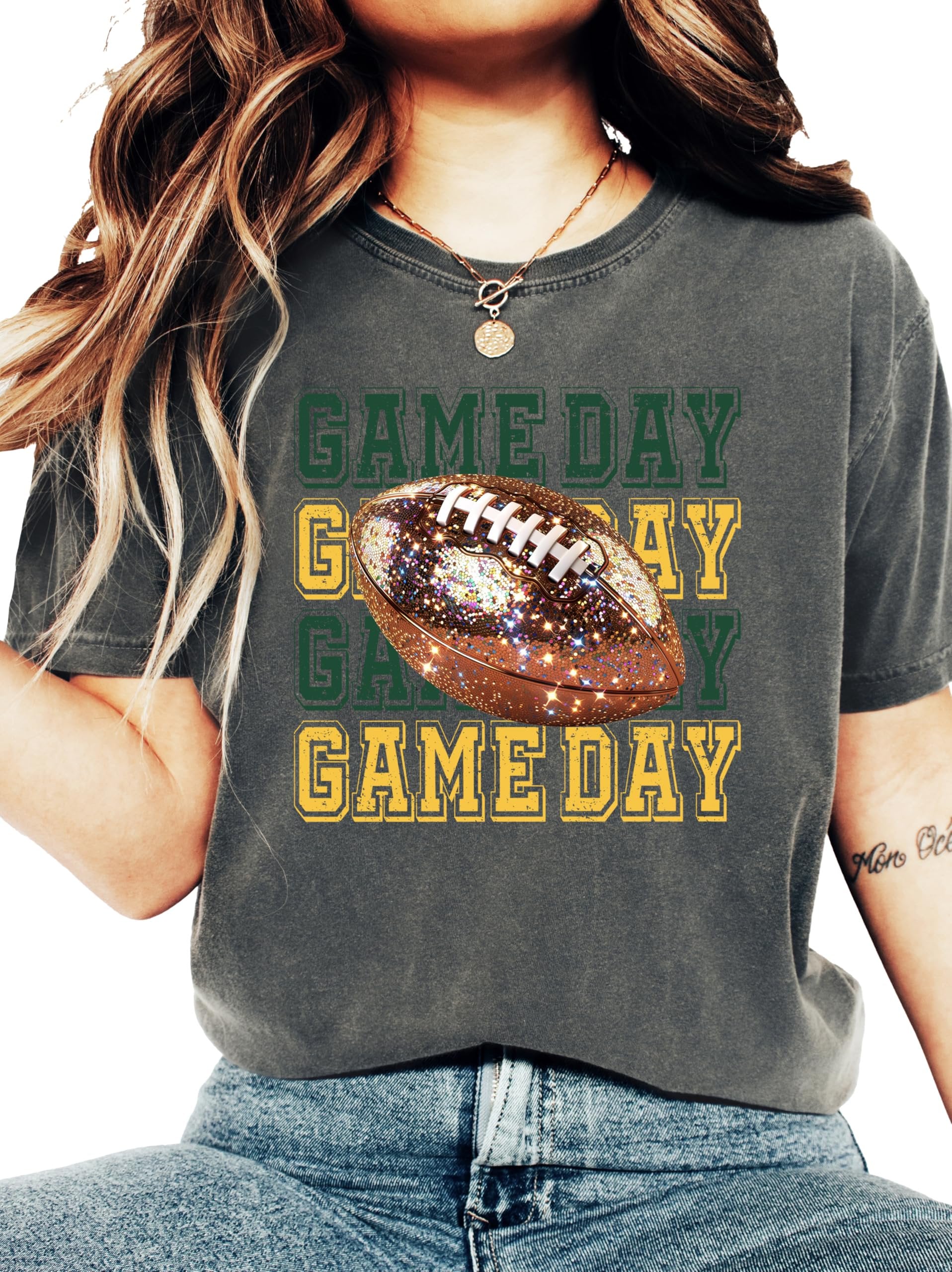 Side or lifestyle view of green and yellow faux glitter football shirt for women