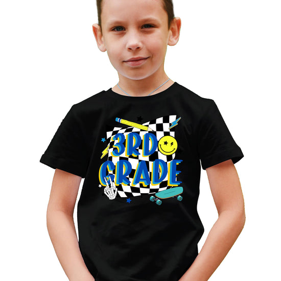 Close-up of retro skateboard graphic print on boys' 3rd grade school shirt