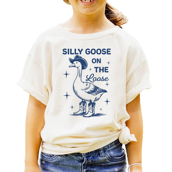 Silly Goose on the Loose kids t-shirt with cowboy goose graphic design in natural color
