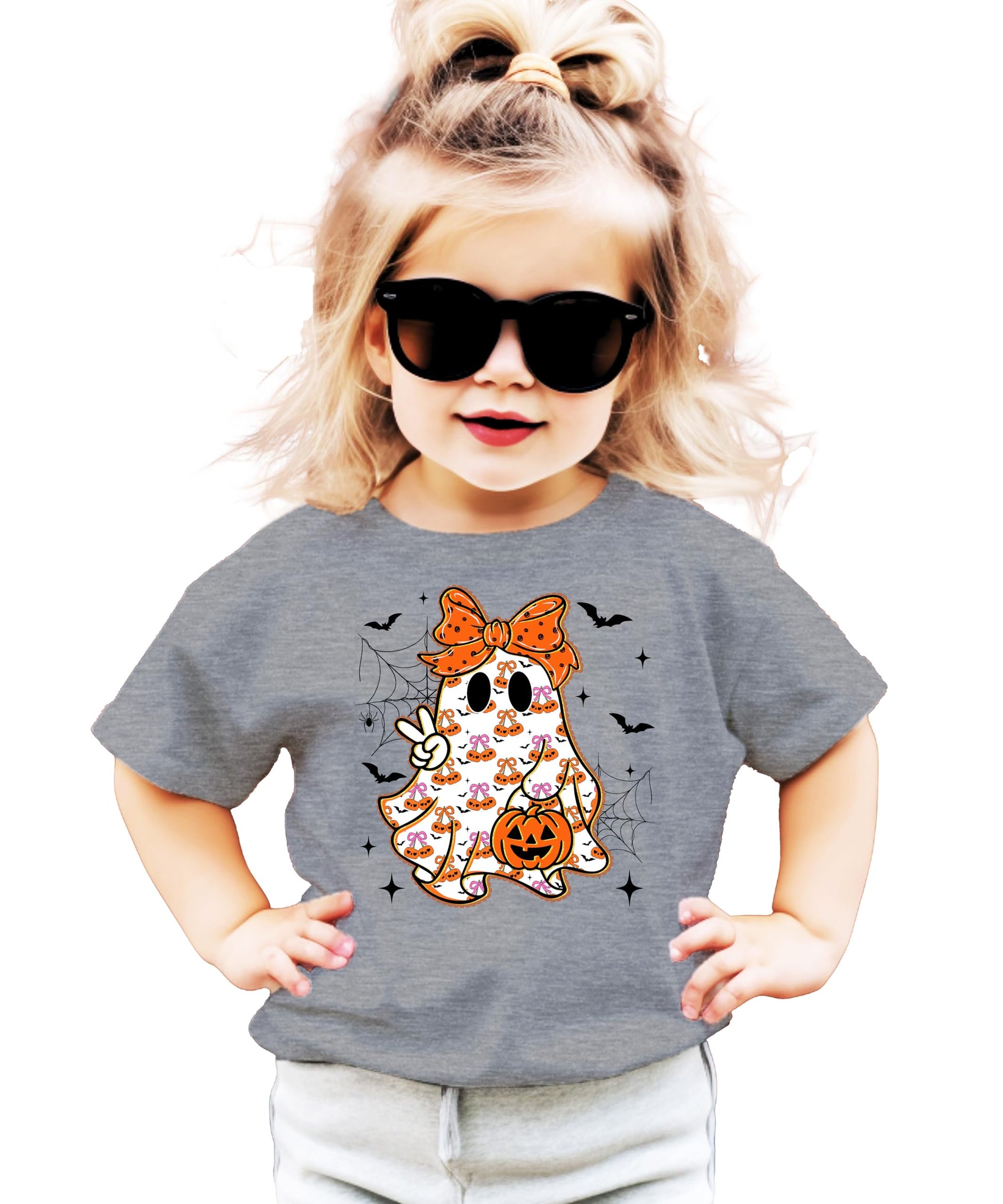 Toddler wearing a girly ghost Halloween graphic tee with orange bow detail in natural color