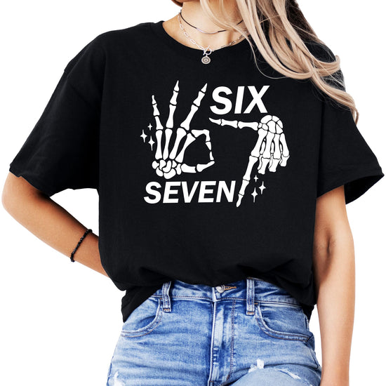Six seven skeleton hand shirt flat lay showing full design and shirt silhouette