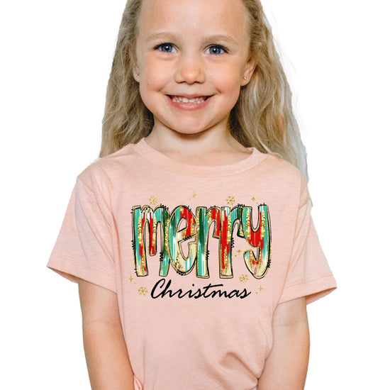 Side view of watercolor holiday matching shirt for mommy and me in peach