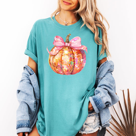 Detail shot of high-quality print on seafoam disco pumpkin Halloween tee for women
