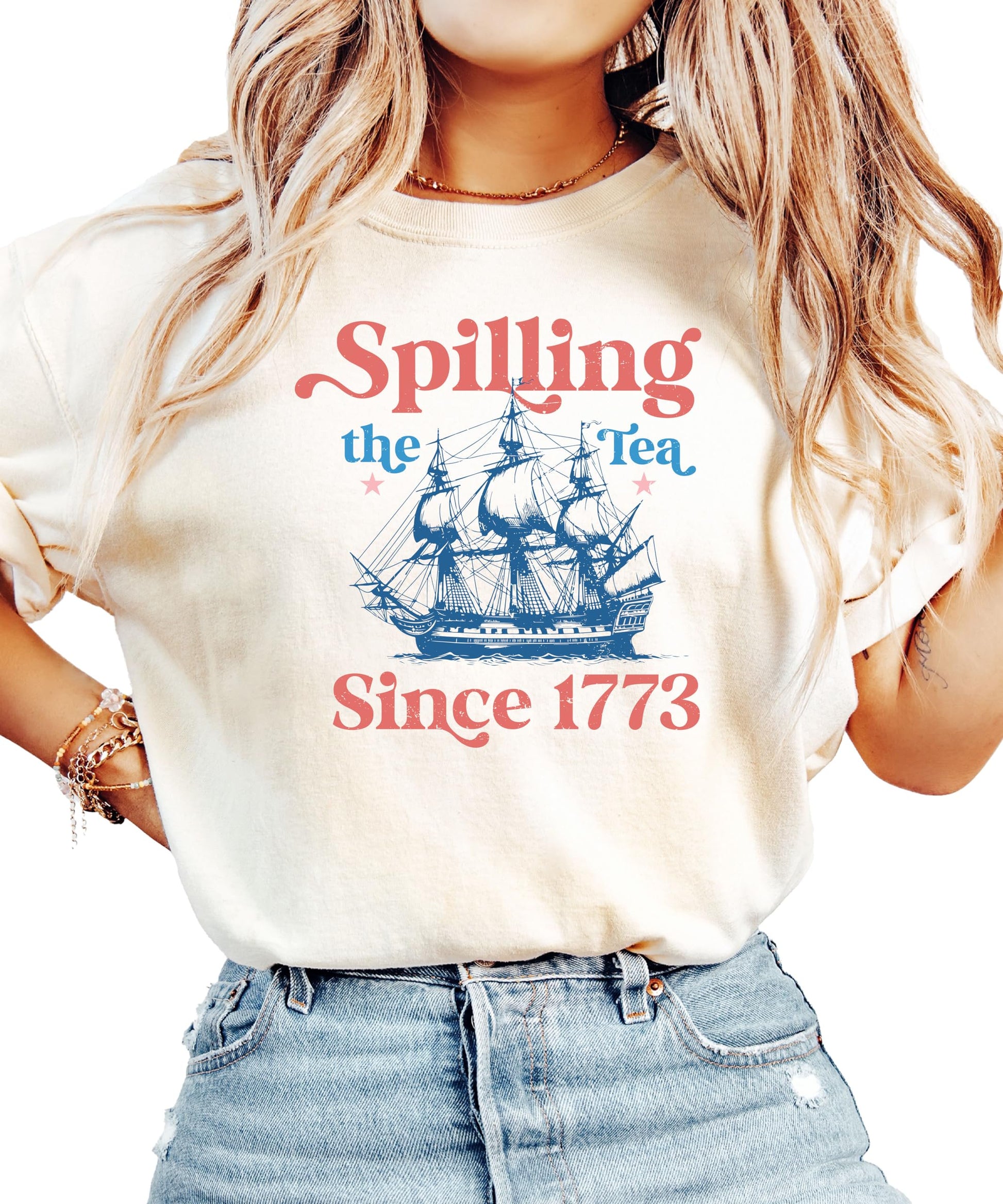 Ivory women's t-shirt with 'Spilling The Tea Since 1773' text design in vintage American style
