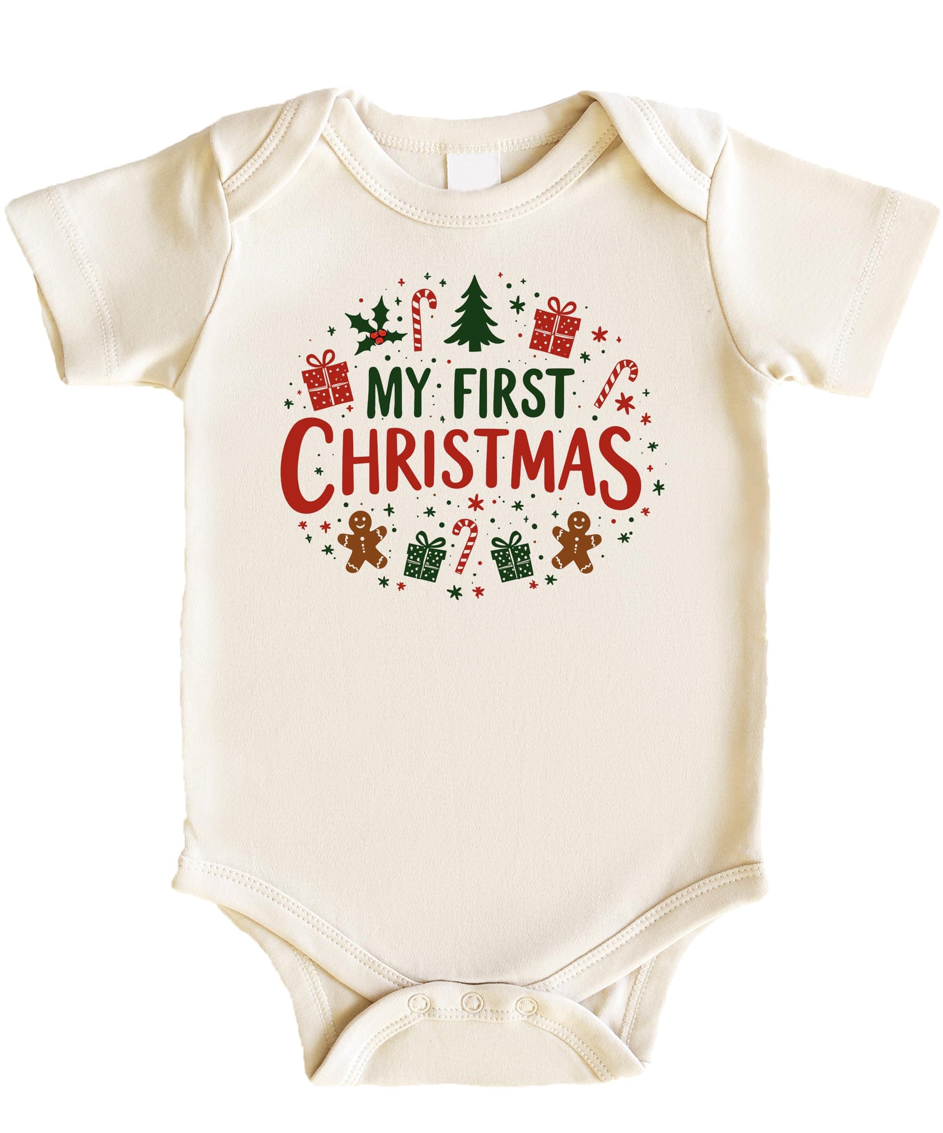 Flat lay of My First Christmas family matching shirts showing newborn and adult sizes