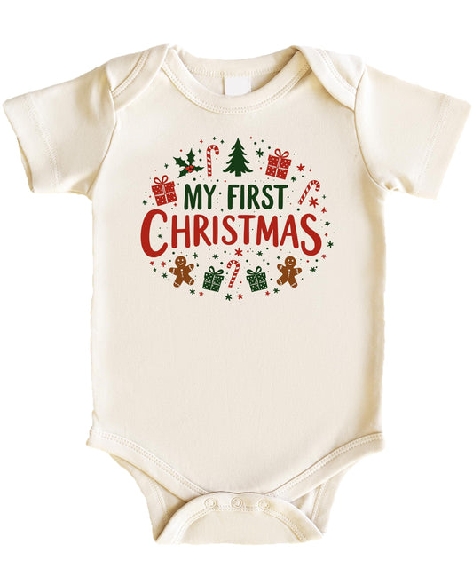 Flat lay of My First Christmas family matching shirts showing newborn and adult sizes