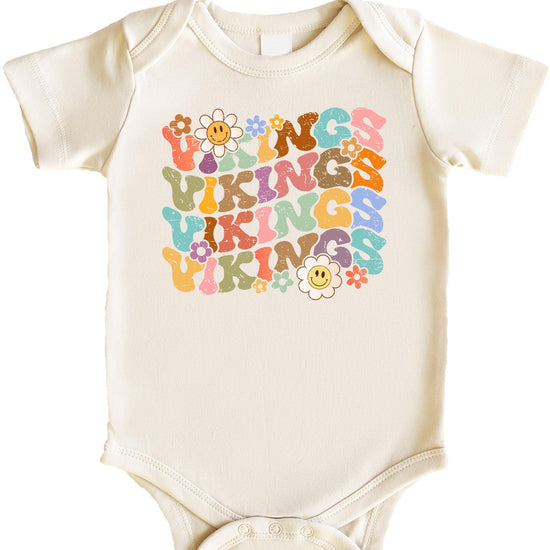 Family Vikings fan shirt collection showing multiple sizes from adult to toddler