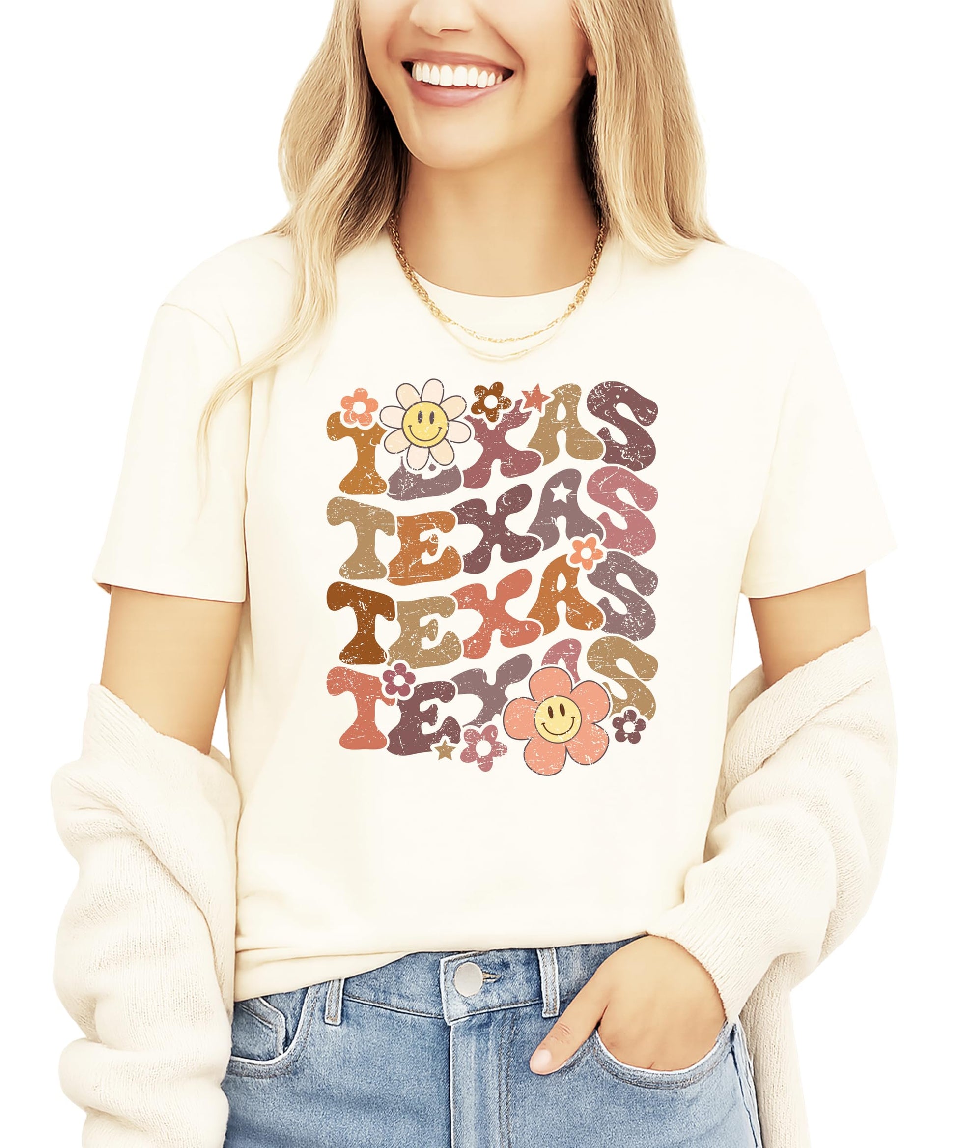 Texas retro game day shirt with colorful groovy TEXAS lettering and smiley flower design on natural background