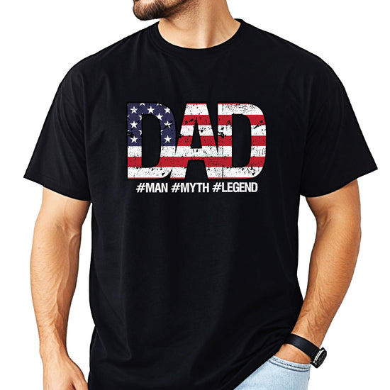 Model wearing patriotic Dad Man Myth Legend graphic tee in navy blue