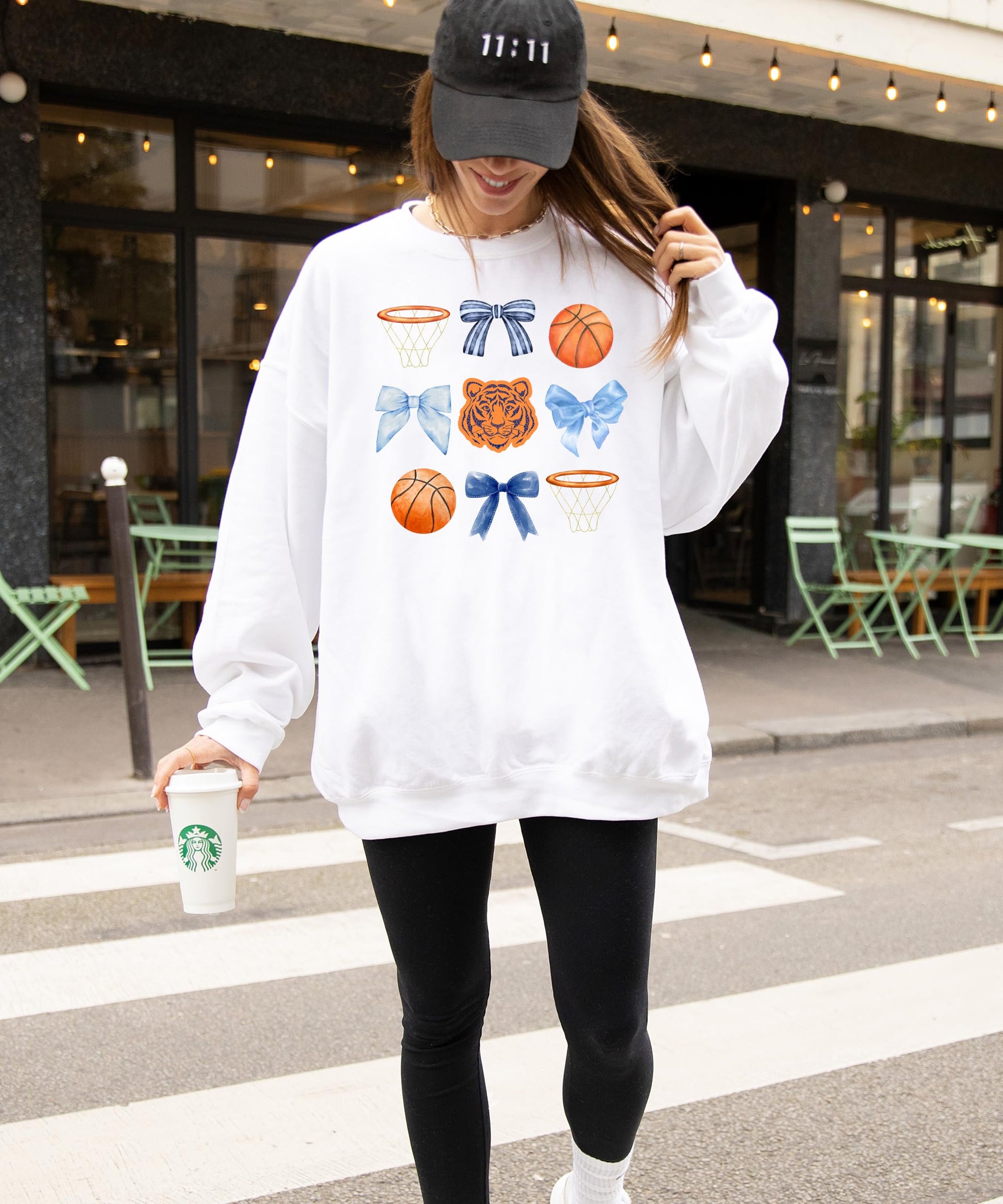 Women's white Tigers basketball fan sweatshirt with girly bow detail, front view