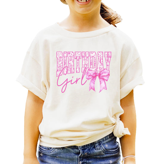 Floral Birthday Girl shirt with pink coquette bow design on light colored tee