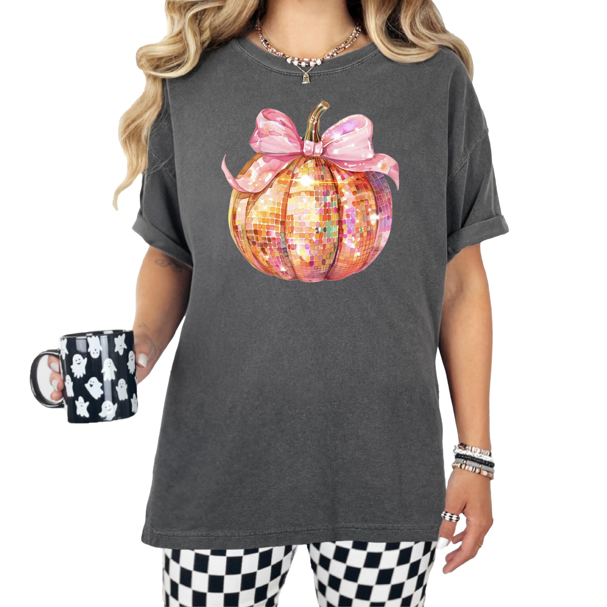 Front view of disco pumpkin coquette bow graphic tee in seafoam green on a model