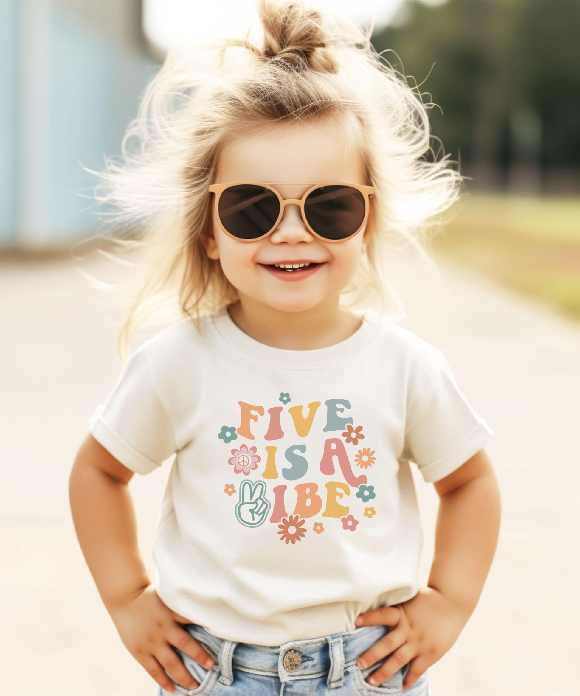 Kids' fifth birthday graphic tee in natural color with groovy flower power lettering design