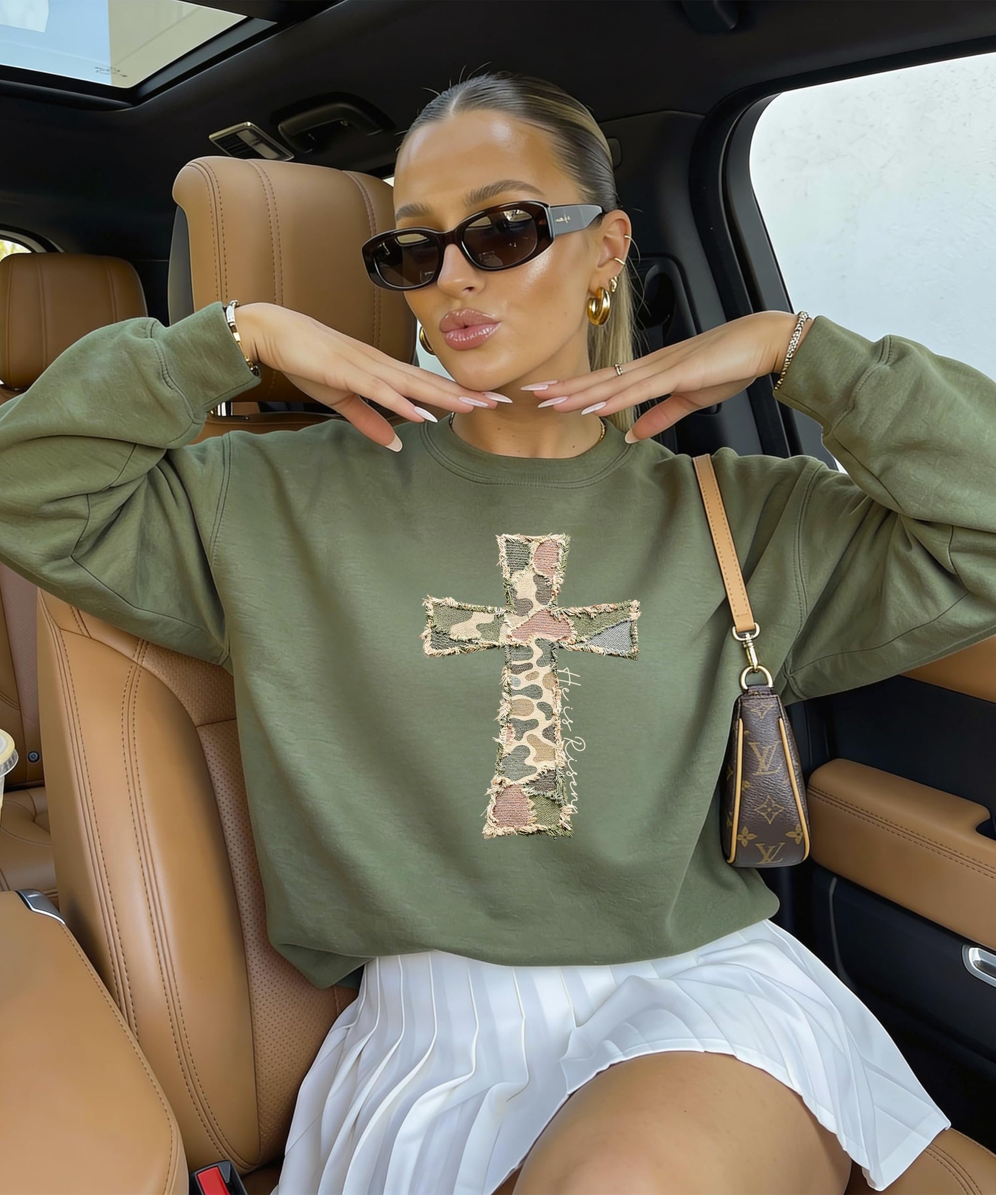 Back or side view of women's camo Christian cross sweatshirt He Is Risen Easter pullover