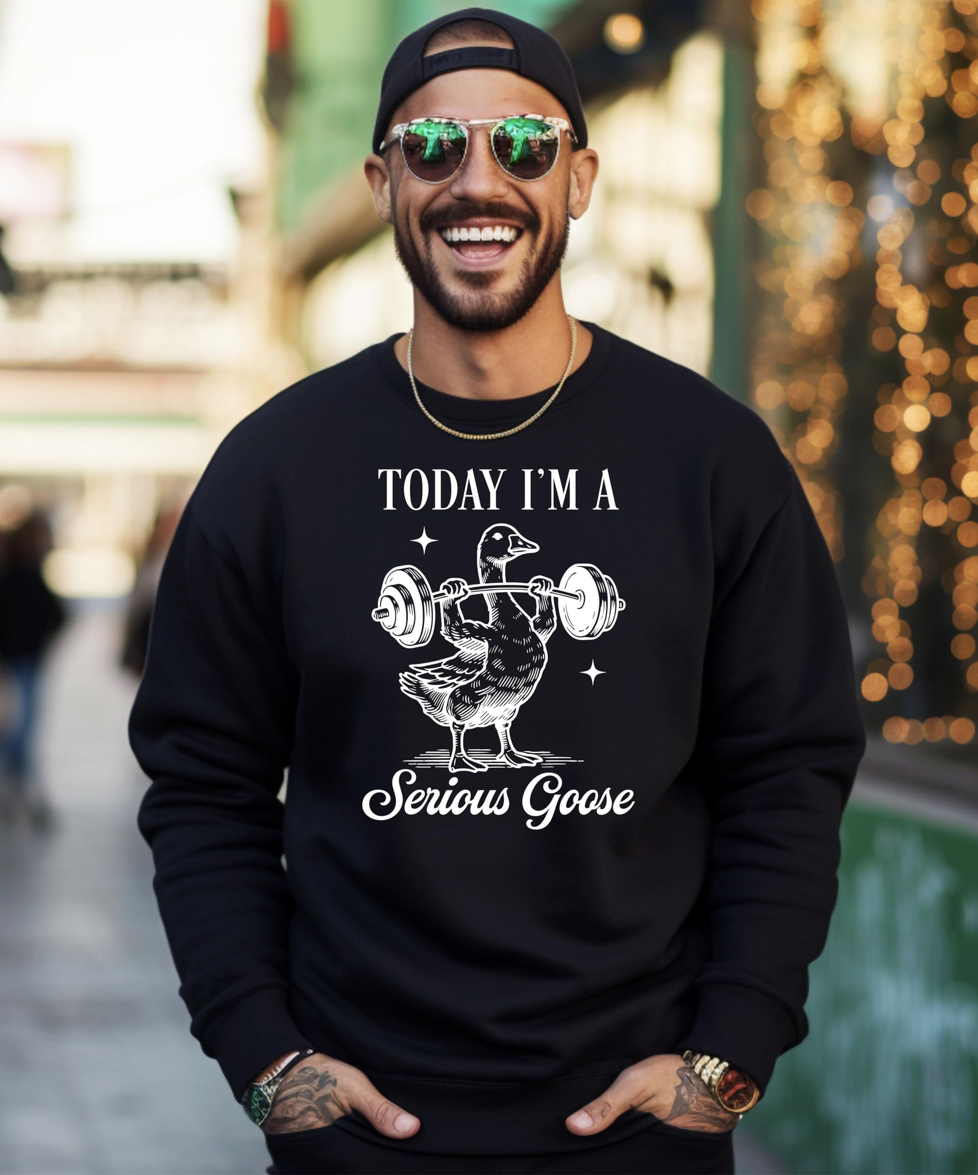 Serious goose weightlifting pullover sweatshirt flat lay showing full design