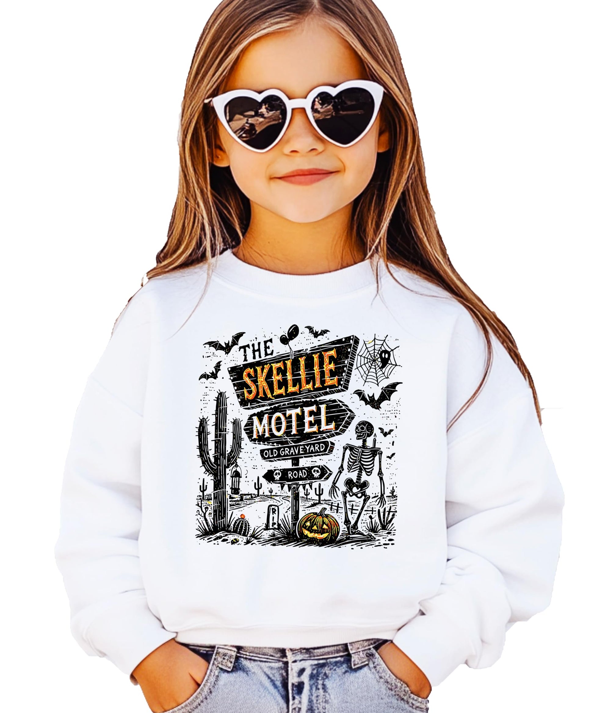 Detail shot of The Skellie Hotel Halloween sweatshirt design featuring glowing pumpkins and skeleton artwork