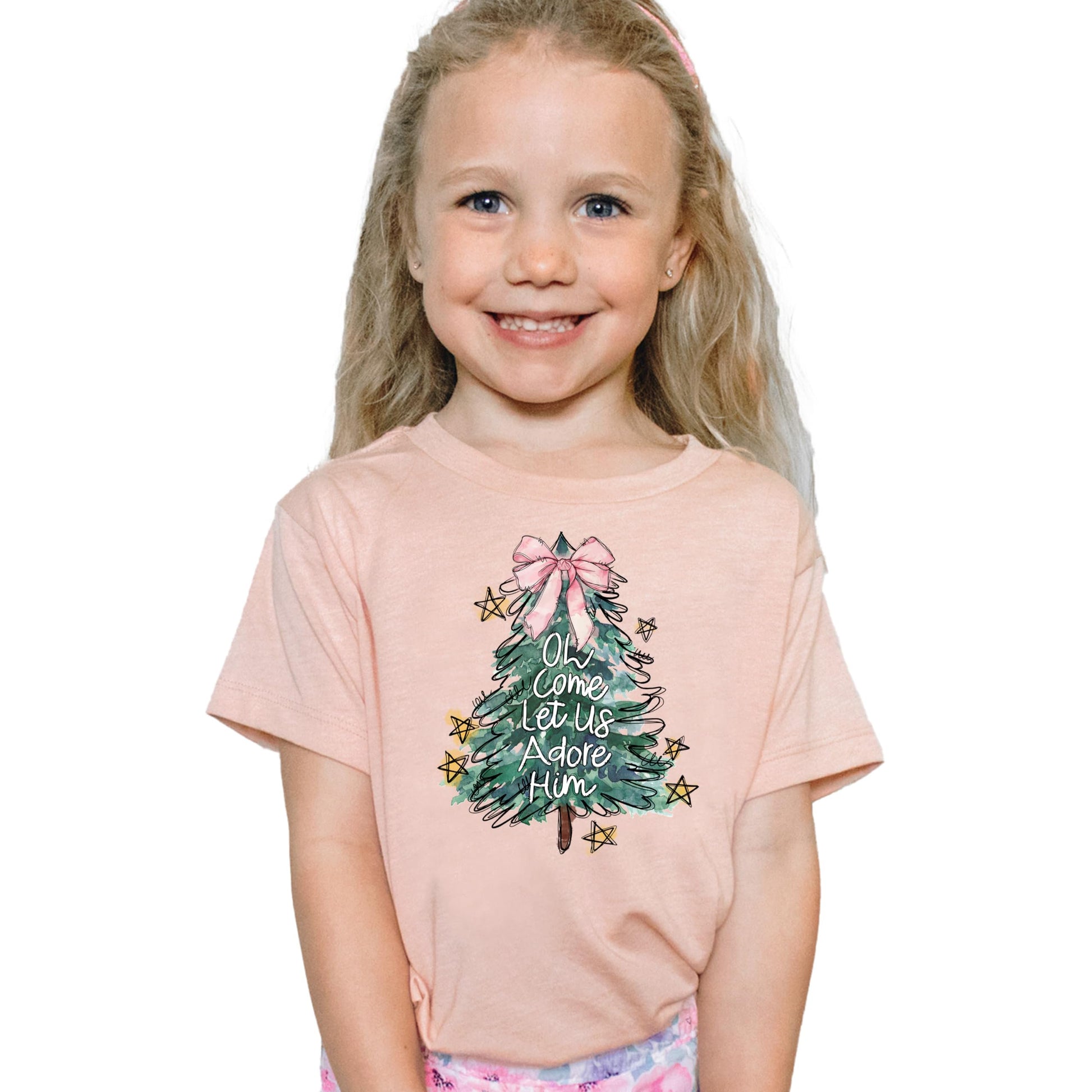 Full product view of girly Christmas tree shirt with faith-inspired holiday message